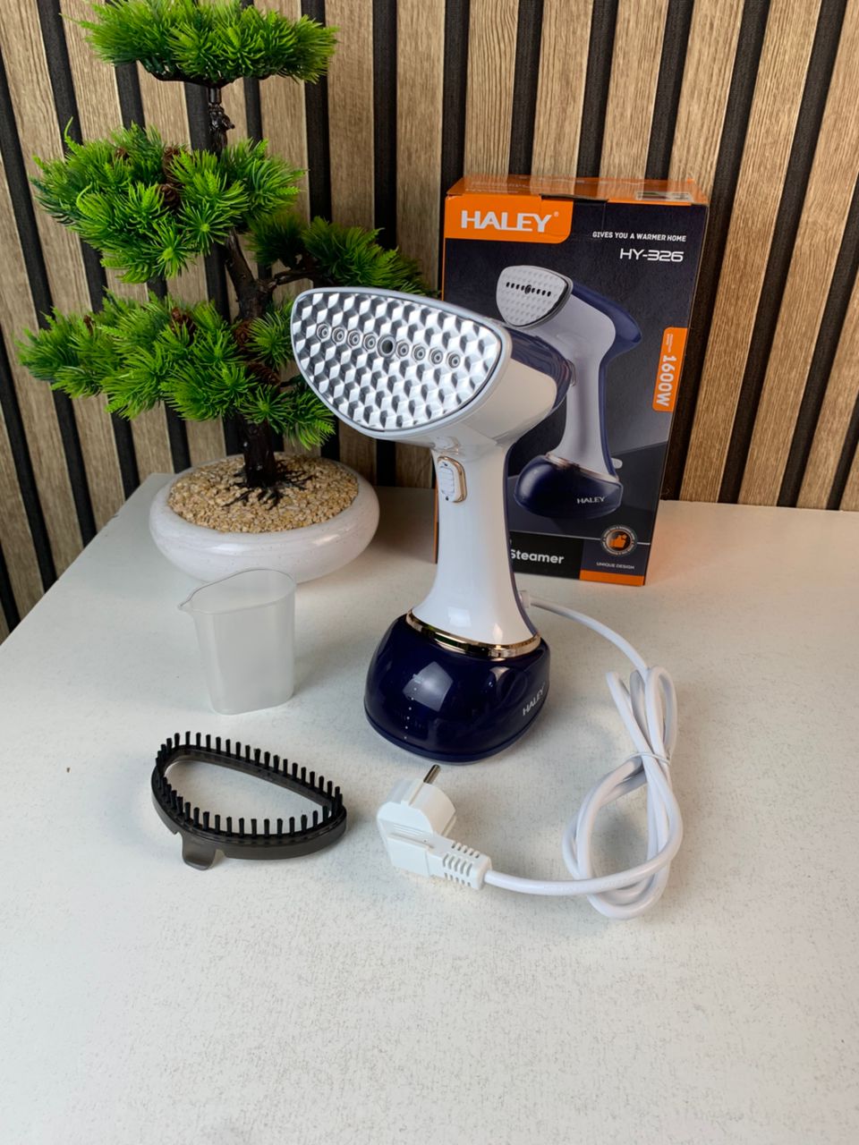 مكواة ملابس محمولة